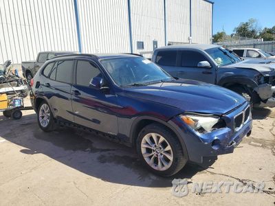 Czwarte zdjęcie samochodu z boku: 2014 BMW X1 XDRIVE28I VIN:WBAVL1C55EVY13710 - miniatura