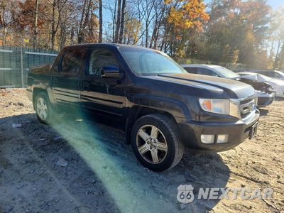 Czwarte zdjęcie samochodu z boku: 2010 HONDA RIDGELINE RTL VIN:5FPYK1F50AB004629 - miniatura