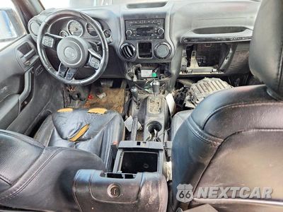 Zdjęcie 8 z 12 samochodu: 2015 JEEP WRANGLER UNLIMITED SAHARA VIN:1C4HJWEG2FL770233 - miniatura