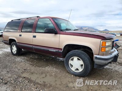 Czwarte zdjęcie samochodu z boku: 1994 GMC SUBURBAN K1500 VIN:1GKFK16K4RJ767882 - miniatura