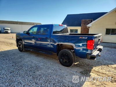 Drugie zdjęcie samochodu z przodu: 2017 CHEVROLET SILVERADO K1500 LT VIN:3GCUKREC9HG424559 - miniatura
