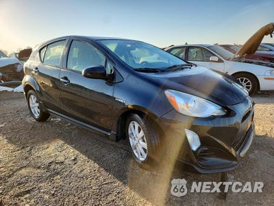 Czwarte zdjęcie samochodu z boku: 2017 TOYOTA PRIUS C THREE VIN:JTDKDTB39H1596320 - miniatura