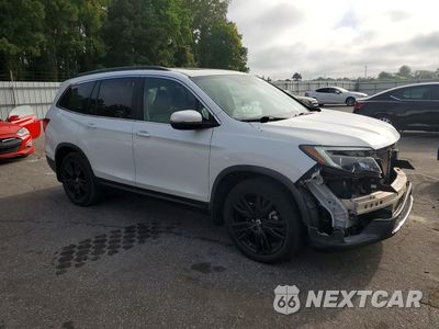 Czwarte zdjęcie samochodu z boku: 2021 HONDA PILOT SE VIN:5FNYF5H2XMB003077 - miniatura