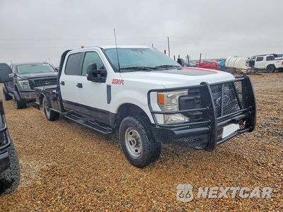 Czwarte zdjęcie samochodu z boku: 2022 FORD F350 SUPER DUTY VIN:1FT8W3BT5NEF88529 - miniatura