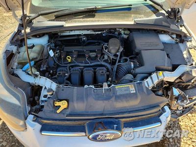 Zdjęcie 12 z 14 samochodu: 2013 FORD FOCUS SE VIN:1FADP3F23DL267215 - miniatura