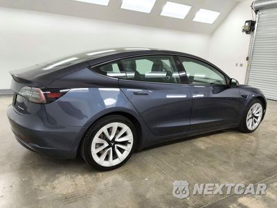 Trzecie zdjęcie samochodu z tyłu: 2022 TESLA MODEL 3 VIN:5YJ3E1EBXNF287662 - miniatura