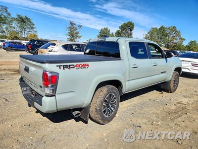 Trzecie zdjęcie samochodu z tyłu: 2022 TOYOTA TACOMA TRD SPORT VIN:3TMCZ5AN1NM525888 - miniatura