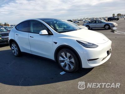 Czwarte zdjęcie samochodu z boku: 2022 TESLA MODEL Y VIN:7SAYGDEE7NF443655 - miniatura