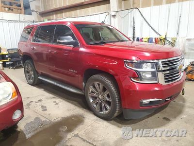 Czwarte zdjęcie samochodu z boku: 2015 CHEVROLET TAHOE C1500 LTZ VIN:1GNSCCKC6FR214365 - miniatura