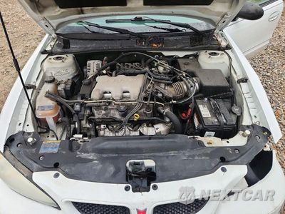Zdjęcie 11 z 12 samochodu: 2004 PONTIAC GRAND AM SE1 VIN:1G2NF52E94C210812 - miniatura
