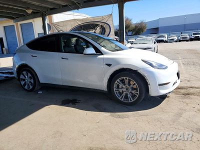 Czwarte zdjęcie samochodu z boku: 2023 TESLA MODEL Y VIN:7SAYGDEE6PF748714 - miniatura