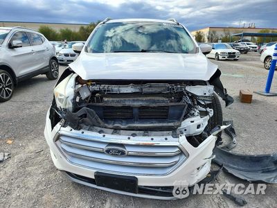 Piąte zdjęcie samochodu w środku: 2017 FORD ESCAPE TITANIUM VIN:1FMCU0J93HUD54299 - miniatura