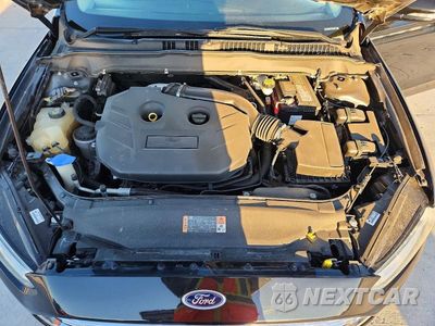 Zdjęcie 11 z 12 samochodu: 2014 FORD FUSION TITANIUM VIN:3FA6P0K99ER163275 - miniatura