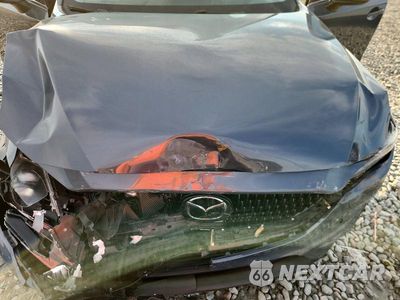 Zdjęcie 12 z 13 samochodu: 2021 MAZDA CX-5 TOURING VIN:JM3KFACM2M0380600 - miniatura