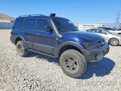 Czwarte zdjęcie samochodu z boku: 2003 MITSUBISHI MONTERO XLS VIN:JA4NW31S03J023969 - miniatura