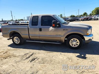 Czwarte zdjęcie samochodu z boku: 2002 FORD F250 SUPER DUTY VIN:1FTNX20F62ED04795 - miniatura