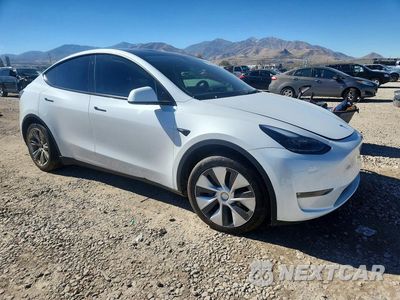 Czwarte zdjęcie samochodu z boku: 2023 TESLA MODEL Y VIN:7SAYGDEE4PF712195 - miniatura