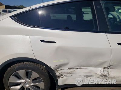 Zdjęcie 10 z 13 samochodu: 2021 TESLA MODEL Y VIN:5YJYGDEEXMF140560 - miniatura