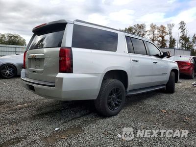 Trzecie zdjęcie samochodu z tyłu: 2019 CHEVROLET SUBURBAN K1500 LT VIN:1GNSKHKC7KR197635 - miniatura