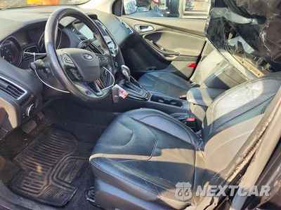 Zdjęcie 7 z 12 samochodu: 2016 FORD FOCUS TITANIUM VIN:1FADP3N28GL256510 - miniatura