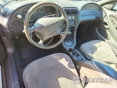 Zdjęcie 8 z 12 samochodu: 1999 FORD MUSTANG VIN:1FAFP444XXF144050 - miniatura
