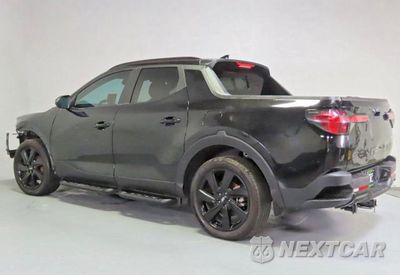 Czwarte zdjęcie samochodu z boku: 2023 HYUNDAI SANTA CRUZ NIGHT VIN:5NTJCDAF9PH062484 - miniatura
