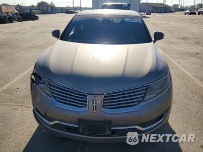 Piąte zdjęcie samochodu w środku: 2016 LINCOLN MKX RESERVE VIN:2LMTJ8LP1GBL66382 - miniatura