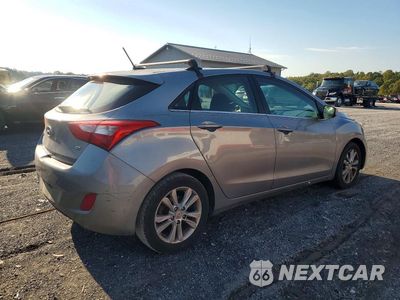 Trzecie zdjęcie samochodu z tyłu: 2014 HYUNDAI ELANTRA GT BASE VIN:KMHD35LH4EU216226 - miniatura
