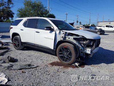 Czwarte zdjęcie samochodu z boku: 2021 CHEVROLET TRAVERSE PREMIER VIN:1GNERKKW4MJ181877 - miniatura