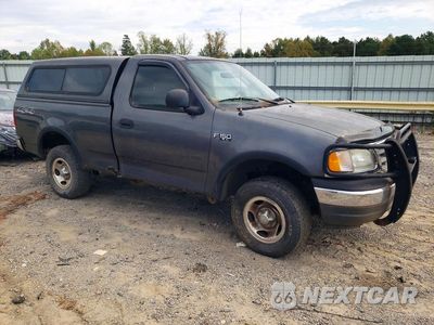 Czwarte zdjęcie samochodu z boku: 2003 FORD F150 XL VIN:1FTRF182X3NB20249 - miniatura