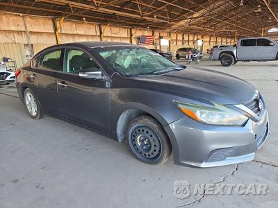 Czwarte zdjęcie samochodu z boku: 2017 NISSAN ALTIMA 2.5 SL VIN:1N4AL3AP1HC284330 - miniatura