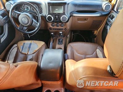 Zdjęcie 8 z 13 samochodu: 2014 JEEP WRANGLER UNLIMITED SAHARA VIN:1C4BJWEG5EL110854 - miniatura