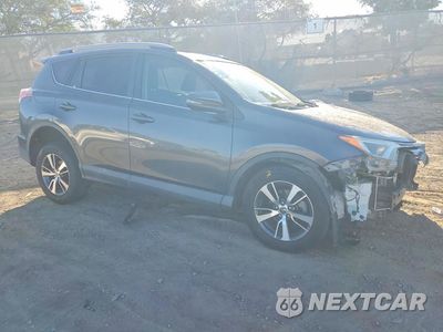 Czwarte zdjęcie samochodu z boku: 2016 TOYOTA RAV4 XLE VIN:2T3WFREV0GW255884 - miniatura