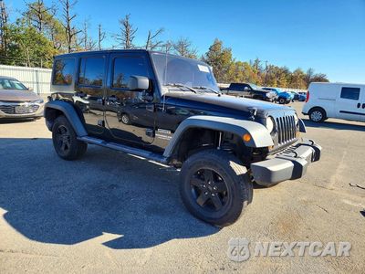 Czwarte zdjęcie samochodu z boku: 2011 JEEP WRANGLER UNLIMITED SPORT VIN:1J4HA3H16BL602332 - miniatura