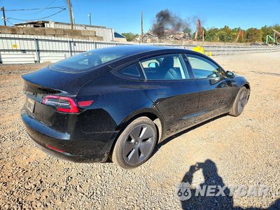 Trzecie zdjęcie samochodu z tyłu: 2023 TESLA MODEL 3 VIN:5YJ3E1EA6PF669133 - miniatura