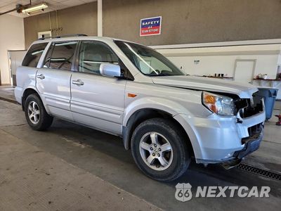 Czwarte zdjęcie samochodu z boku: 2007 HONDA PILOT EX VIN:2HKYF18427H532510 - miniatura