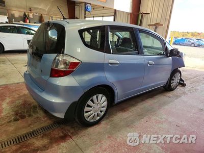 Trzecie zdjęcie samochodu z tyłu: 2010 HONDA FIT VIN:JHMGE8H20AC016444 - miniatura