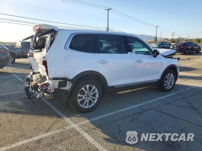 Trzecie zdjęcie samochodu z tyłu: 2022 KIA TELLURIDE LX VIN:5XYP24HC7NG299390 - miniatura