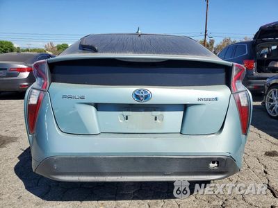Zdjęcie 6 z 12 samochodu: 2017 TOYOTA PRIUS TWO VIN:JTDKBRFU9H3031856 - miniatura