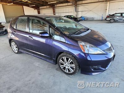 Czwarte zdjęcie samochodu z boku: 2009 HONDA FIT SPORT VIN:JHMGE88409S013109 - miniatura