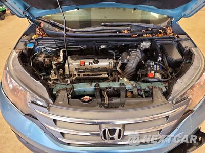 Zdjęcie 12 z 13 samochodu: 2014 HONDA CR-V EXL VIN:2HKRM4H75EH713782 - miniatura