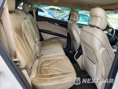 Zdjęcie 11 z 13 samochodu: 2016 LINCOLN MKX RESERVE VIN:2LMTJ6LR5GBL45976 - miniatura