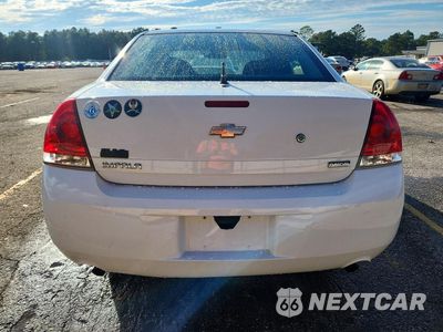 Zdjęcie 6 z 12 samochodu: 2013 CHEVROLET IMPALA POLICE VIN:2G1WD5E31D1241731 - miniatura