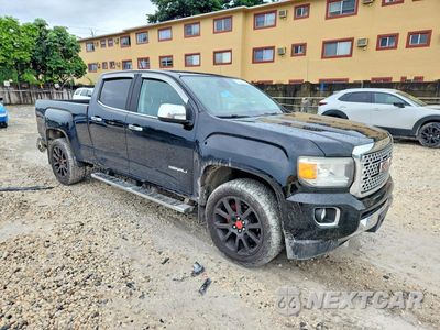 Czwarte zdjęcie samochodu z boku: 2017 GMC CANYON DENALI VIN:1GTG6EEN0H1251217 - miniatura