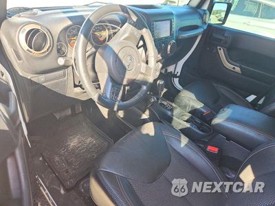 Zdjęcie 8 z 14 samochodu: 2016 JEEP WRANGLER UNLIMITED SAHARA VIN:1C4BJWEG9GL328508 - miniatura