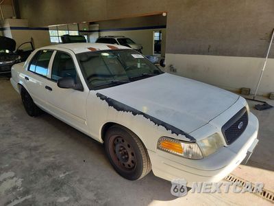 Czwarte zdjęcie samochodu z boku: 2009 FORD CROWN VICTORIA POLICE INTERCEPTOR VIN:2FAHP71V69X123730 - miniatura