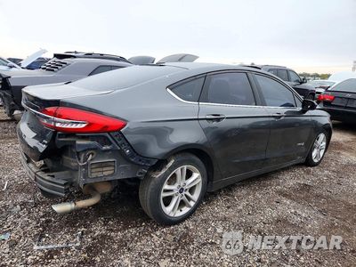 Trzecie zdjęcie samochodu z tyłu: 2018 FORD FUSION SE HYBRID VIN:3FA6P0LUXJR109271 - miniatura