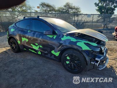 Czwarte zdjęcie samochodu z boku: 2021 TESLA MODEL Y VIN:5YJYGAEE7MF271881 - miniatura