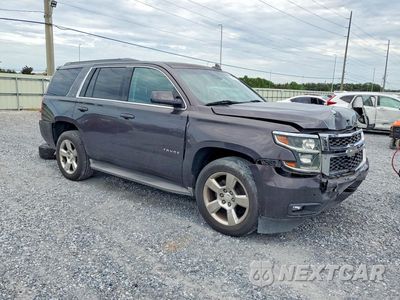Czwarte zdjęcie samochodu z boku: 2015 CHEVROLET TAHOE C1500 LT VIN:1GNSCBKC6FR634489 - miniatura