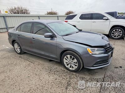 Czwarte zdjęcie samochodu z boku: 2016 VOLKSWAGEN JETTA SE VIN:3VWD67AJ1GM324272 - miniatura